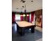 Game room with large pool table at 34421 Countryside Dr, Wesley Chapel, FL 33543