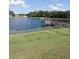 Peaceful lakefront with a dock at 34421 Countryside Dr, Wesley Chapel, FL 33543