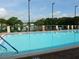Relaxing community pool with lake views at 34421 Countryside Dr, Wesley Chapel, FL 33543