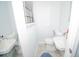 Small half bathroom with pedestal sink and tile floors at 4506 24Th S Ave, Tampa, FL 33619