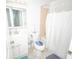 Clean bathroom with a white vanity, tub shower combo, and tile floors at 4506 24Th S Ave, Tampa, FL 33619