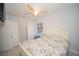 Bright bedroom with a large bed and ceiling fan at 4506 24Th S Ave, Tampa, FL 33619
