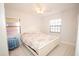 Comfortable bedroom with a queen-size bed and plenty of natural light at 4506 24Th S Ave, Tampa, FL 33619