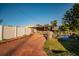 Long driveway leading to a ranch style home with a fenced backyard at 4506 24Th S Ave, Tampa, FL 33619