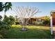 House exterior showcasing a well-maintained lawn and landscaping at 4506 24Th S Ave, Tampa, FL 33619