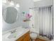 Clean bathroom with a shower/tub combo, vanity, and updated fixtures at 5301 Watson Rd, Riverview, FL 33578