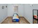 bedroom with carpet, window, and a full-length mirror at 5301 Watson Rd, Riverview, FL 33578