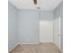 Simple bedroom with carpet, double door closet and ceiling fan at 5301 Watson Rd, Riverview, FL 33578