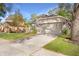 House exterior showcasing a two-car garage and well-maintained lawn at 5301 Watson Rd, Riverview, FL 33578