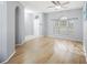 Bright living room with hardwood floors and a large window at 5301 Watson Rd, Riverview, FL 33578