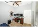 Bright home office featuring a desk, multiple monitors, and ample storage at 5301 Watson Rd, Riverview, FL 33578