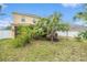 Large backyard with patio and mature landscaping at 534 19Th Nw St, Ruskin, FL 33570