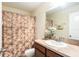 Clean bathroom with shower/tub combo and updated vanity at 534 19Th Nw St, Ruskin, FL 33570