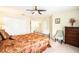 Bright bedroom with walk-in closet and access to hallway at 534 19Th Nw St, Ruskin, FL 33570