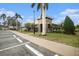 Community clubhouse entrance and landscaping at 534 19Th Nw St, Ruskin, FL 33570