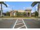 Community clubhouse with palm trees and parking at 534 19Th Nw St, Ruskin, FL 33570