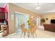 Breakfast nook with glass table and wicker chairs at 534 19Th Nw St, Ruskin, FL 33570