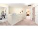 Upstairs hallway with access to bedrooms and a full bathroom at 534 19Th Nw St, Ruskin, FL 33570