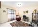 Home office with built-in shelving and a comfortable reading chair at 534 19Th Nw St, Ruskin, FL 33570