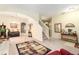 Living room with a view of the entryway, stairs, and dining area at 534 19Th Nw St, Ruskin, FL 33570