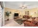 Bright living room with comfortable seating and access to the kitchen at 534 19Th Nw St, Ruskin, FL 33570