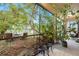 Relaxing screened porch overlooking backyard patio at 534 19Th Nw St, Ruskin, FL 33570