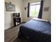 Bedroom with a double bed, TV stand and window at 558 Harbor Ridge Dr, Palm Harbor, FL 34683