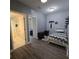 Small bedroom with twin bed, nightstands and access to a bathroom at 558 Harbor Ridge Dr, Palm Harbor, FL 34683