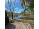 Beautiful lake view from the backyard patio at 558 Harbor Ridge Dr, Palm Harbor, FL 34683