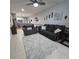 Relaxing living room with comfortable seating and large area rug at 558 Harbor Ridge Dr, Palm Harbor, FL 34683