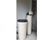 Whole-house water softener system installed in the garage at 558 Harbor Ridge Dr, Palm Harbor, FL 34683