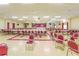 Large community room with tables and chairs at 5660 80Th N St # C307, St Petersburg, FL 33709