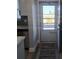 Bright entryway with updated flooring and view to kitchen at 5660 80Th N St # C307, St Petersburg, FL 33709