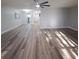 Spacious living area featuring hardwood floors and high ceilings at 5660 80Th N St # C307, St Petersburg, FL 33709