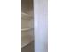 Empty pantry with white shelves at 5660 80Th N St # C307, St Petersburg, FL 33709