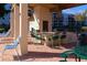 Outdoor kitchen with grill and seating perfect for entertaining at 5660 80Th N St # C307, St Petersburg, FL 33709