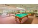 Community recreation room with billiard and ping pong tables at 5660 80Th N St # C307, St Petersburg, FL 33709