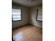 Spacious bedroom with two windows at 5902 18Th St, Zephyrhills, FL 33542