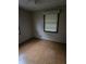 Empty bedroom with tiled flooring at 5902 18Th St, Zephyrhills, FL 33542
