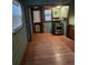 Efficient kitchen with wood cabinets and flooring at 5902 18Th St, Zephyrhills, FL 33542
