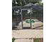 Enclosed pool area with a gate and surrounding fence at 5902 18Th St, Zephyrhills, FL 33542