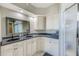 Updated bathroom with double vanity and walk-in shower at 6315 Shoreline Dr # 3202, St Petersburg, FL 33708