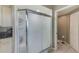 Clean bathroom with shower and additional storage at 6315 Shoreline Dr # 3202, St Petersburg, FL 33708