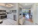 Bright entryway with view into living room and kitchen at 6315 Shoreline Dr # 3202, St Petersburg, FL 33708
