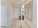 Clean entryway with tile floors and built-in bench at 6315 Shoreline Dr # 3202, St Petersburg, FL 33708