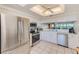 Modern kitchen with stainless steel appliances and white cabinets at 6315 Shoreline Dr # 3202, St Petersburg, FL 33708