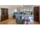Living room features hardwood floors, leather furniture and water views at 6315 Shoreline Dr # 3202, St Petersburg, FL 33708
