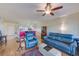 Spacious living room with hardwood floors and comfy seating at 6315 Shoreline Dr # 3202, St Petersburg, FL 33708