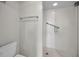 Clean bathroom with shower and grab bars at 632 Edgewater Dr # 439, Dunedin, FL 34698