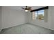 Bright bedroom with a ceiling fan and ample floor space at 632 Edgewater Dr # 439, Dunedin, FL 34698